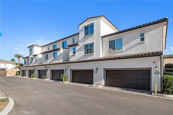 Attached, Exterior, Facade, Mediterranean