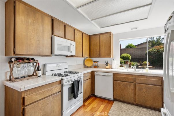 Interior, Kitchen, Tile Countertops, Wood Texture Flooring