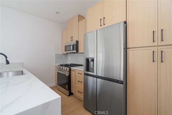 Interior, Kitchen, Recessed Lighting, Stainless Steel Appliances, Wood Texture Flooring