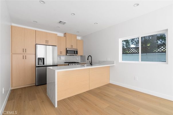 Interior, Kitchen, Recessed Lighting, Stainless Steel Appliances, Wood Texture Flooring