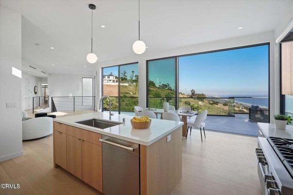 Dining room, Interior, Kitchen, Pendant Lights, Recessed Lighting, Stainless Steel Appliances, Water, Wood Texture Flooring