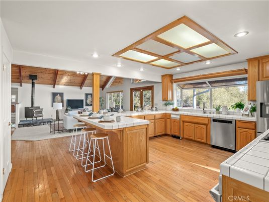 Fireplace, Interior, Kitchen, Recessed Lighting, Stainless Steel Appliances, Tile Countertops, Wooden Beams, Wooden Ceilings, Wood Texture Flooring