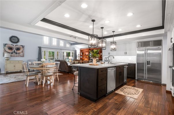 Dining room, Interior, Kitchen, Pendant Lights, Recessed Lighting, Stainless Steel Appliances, Wood Texture Flooring