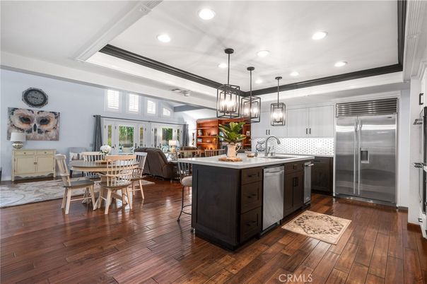 Dining room, Interior, Kitchen, Pendant Lights, Recessed Lighting, Stainless Steel Appliances, Wood Texture Flooring