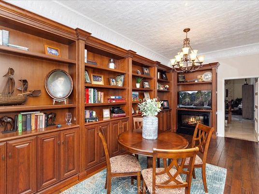 Chandelier, Dining room, Fireplace, Interior, Wood Texture Flooring