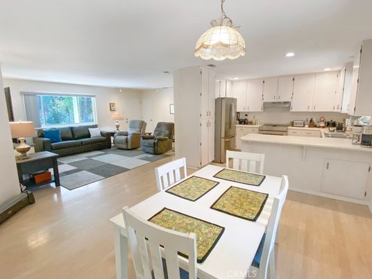 Dining room, Interior, Kitchen, Living room, Pendant Lights, Recessed Lighting, Stainless Steel Appliances, Wood Texture Flooring