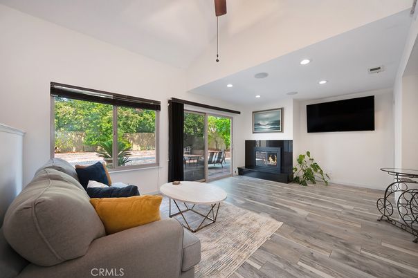 Fireplace, Interior, Living room, Recessed Lighting, Wood Texture Flooring