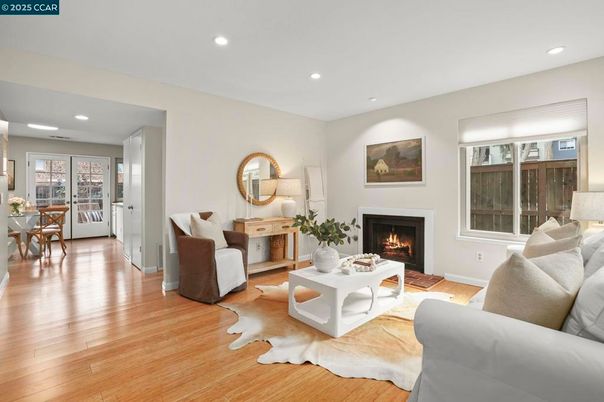 Dining room, Fireplace, Interior, Living room, Recessed Lighting, Wood Texture Flooring