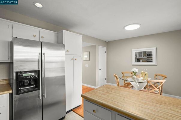 Dining room, Interior, Kitchen, Recessed Lighting, Stainless Steel Appliances, Wood Texture Flooring