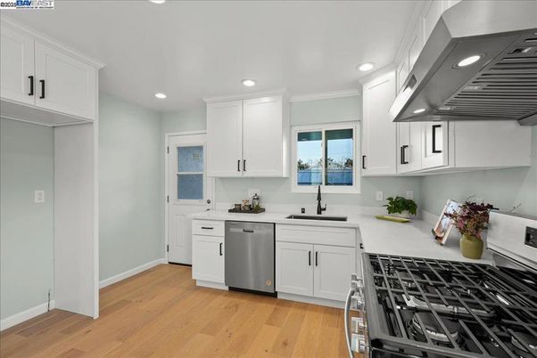 Interior, Kitchen, Recessed Lighting, Stainless Steel Appliances, Wood Texture Flooring