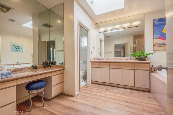 Bathroom, Dual Sink Vanities, Interior, Recessed Lighting, Wood Texture Flooring