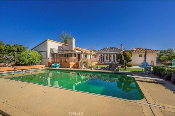 Exterior, Pool, Solar Panels