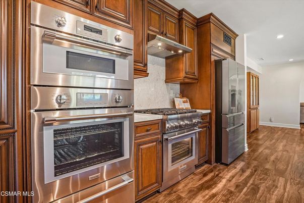 Interior, Kitchen, Recessed Lighting, Stainless Steel Appliances, Wood Texture Flooring