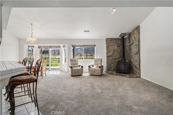 Dining room, Fireplace, Interior, Living room, Pendant Lights, Stone Walls