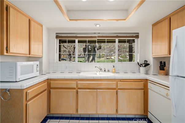 Interior, Kitchen, Recessed Lighting, Tile Countertops