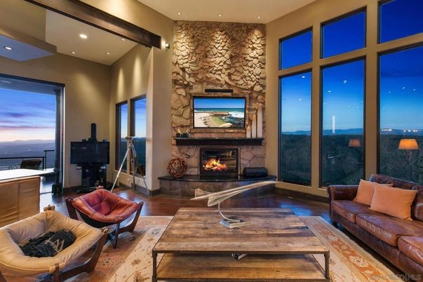 Fireplace, Interior, Living room, Recessed Lighting, Stone Walls, Water, Wooden Beams, Wood Texture Flooring