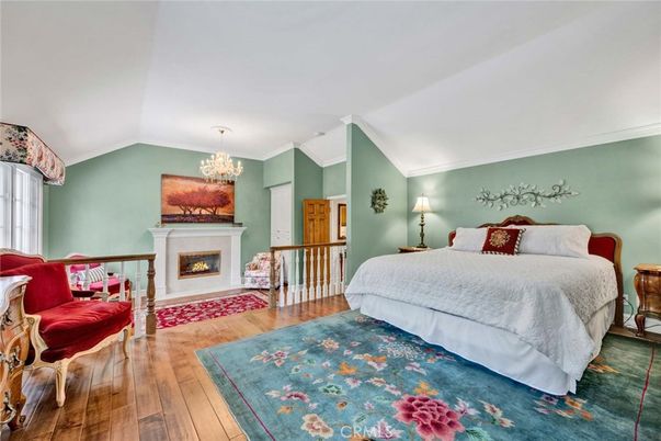 Bedroom, Chandelier, Fireplace, Interior, Wood Texture Flooring