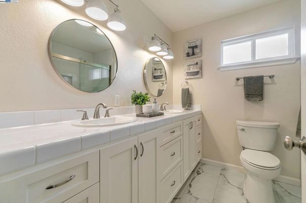 Bathroom, Dual Sink Vanities, Interior, Marble, Tile Countertops