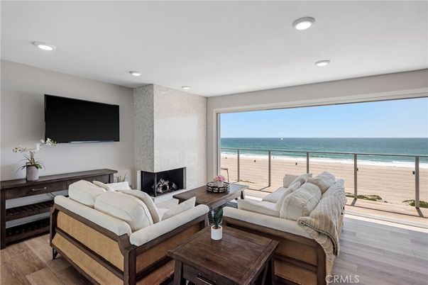 Fireplace, Interior, Living room, Recessed Lighting, Water, Wood Texture Flooring