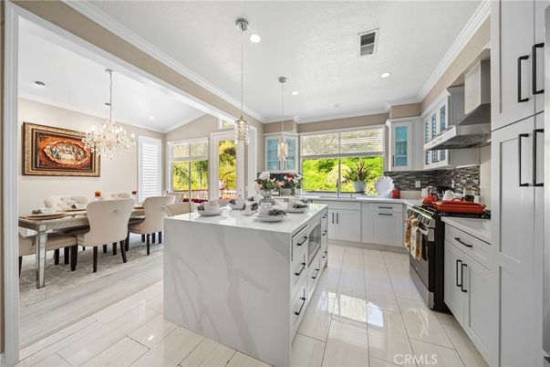 Chandelier, Dining room, Interior, Kitchen, Pendant Lights, Recessed Lighting, Stainless Steel Appliances