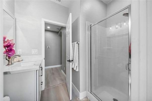 Bathroom, Glass Shower, Interior, Recessed Lighting, Wood Texture Flooring