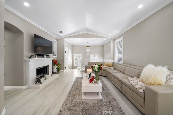 Dining room, Fireplace, Interior, Living room, Pendant Lights, Recessed Lighting, Wood Texture Flooring
