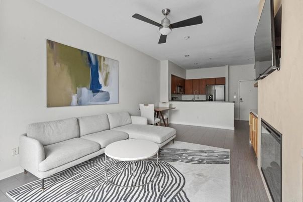 Dining room, Interior, Kitchen, Living room, Recessed Lighting, Stainless Steel Appliances, Wood Texture Flooring