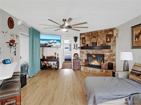 Bedroom, Fireplace, Interior, Stone Walls, Wood Texture Flooring