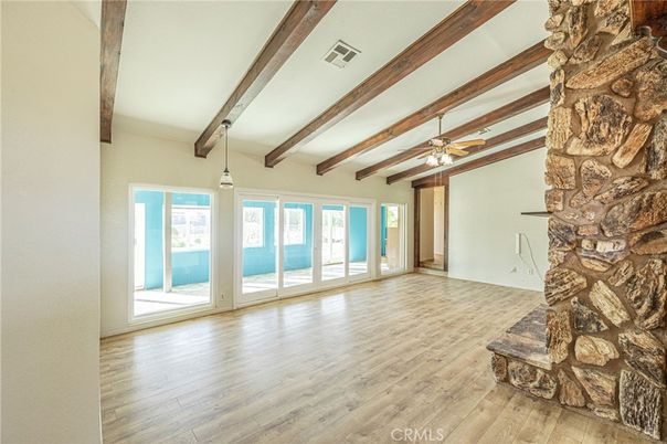 Fireplace, Interior, Living room, Pendant Lights, Stone Walls, Wooden Beams, Wood Texture Flooring