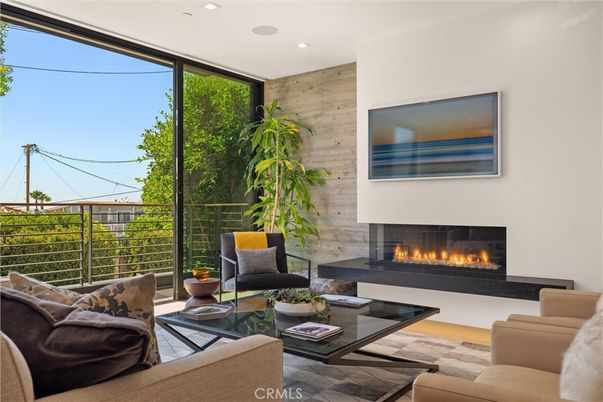 Fireplace, Interior, Living room, Recessed Lighting, Stone Walls, Wood Texture Flooring