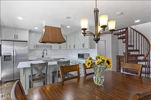 Chandelier, Dining room, Interior, Kitchen, Pendant Lights, Recessed Lighting, Stainless Steel Appliances