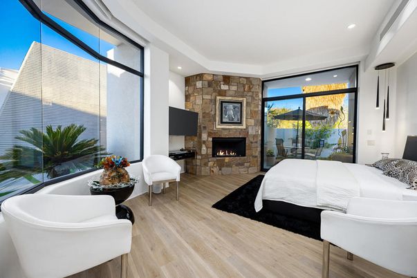 Bedroom, Fireplace, Interior, Pendant Lights, Recessed Lighting, Stone Walls, Wood Texture Flooring