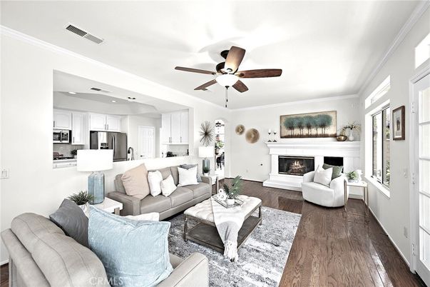 Fireplace, Interior, Kitchen, Living room, Recessed Lighting, Stainless Steel Appliances, Wood Texture Flooring
