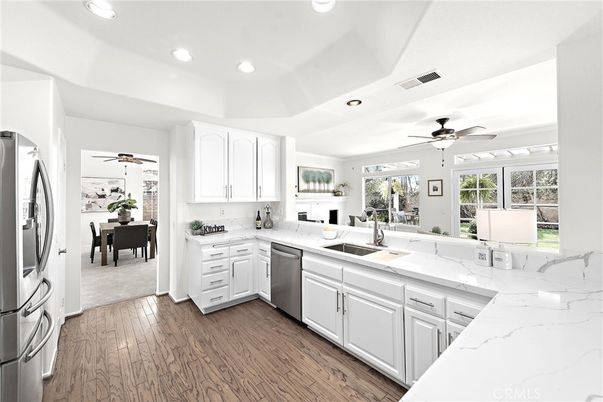 Dining room, Interior, Kitchen, Recessed Lighting, Stainless Steel Appliances, Wood Texture Flooring