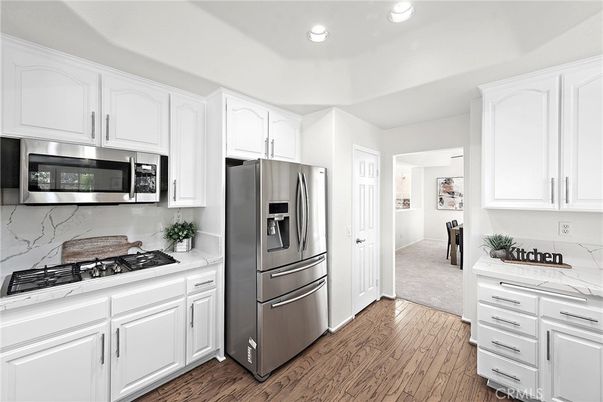 Interior, Kitchen, Recessed Lighting, Stainless Steel Appliances, Wood Texture Flooring