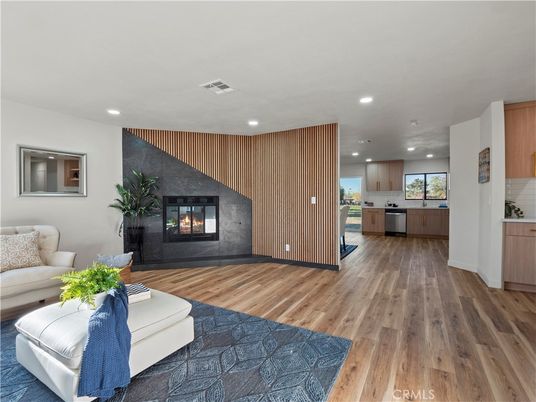 Fireplace, Interior, Kitchen, Living room, Recessed Lighting, Stainless Steel Appliances, Wood Texture Flooring