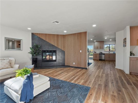 Fireplace, Interior, Kitchen, Living room, Recessed Lighting, Stainless Steel Appliances, Wood Texture Flooring