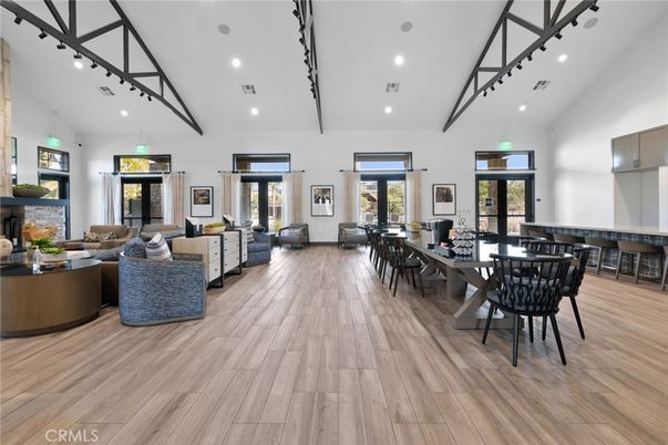 Dining room, Fireplace, Interior, Living room, Recessed Lighting, Wood Texture Flooring