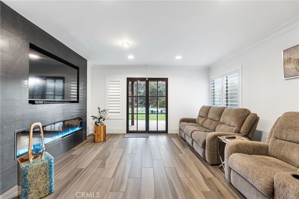 Fireplace, Interior, Living room, Recessed Lighting, Wood Texture Flooring