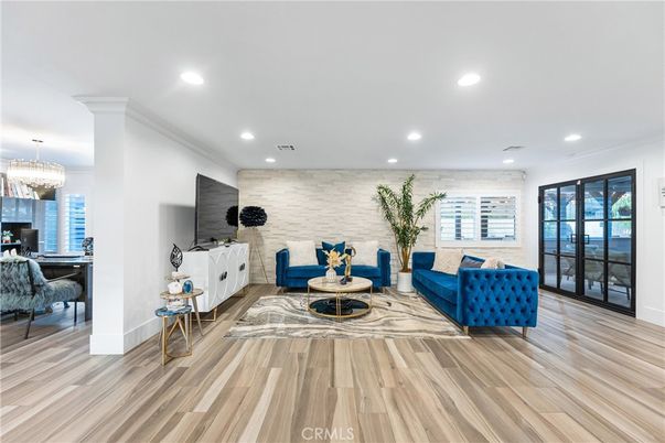 Chandelier, Interior, Living room, Recessed Lighting, Stone Walls, Wood Texture Flooring