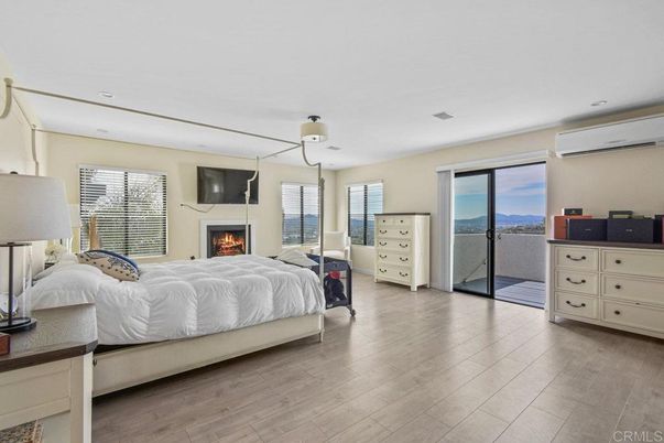 Bedroom, Fireplace, Interior, Recessed Lighting, Wood Texture Flooring