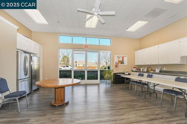 Dining room, Interior, Kitchen, Recessed Lighting, Stainless Steel Appliances, Wood Texture Flooring