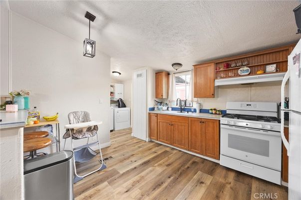 Interior, Kitchen, Pendant Lights, Stainless Steel Appliances, Wood Texture Flooring
