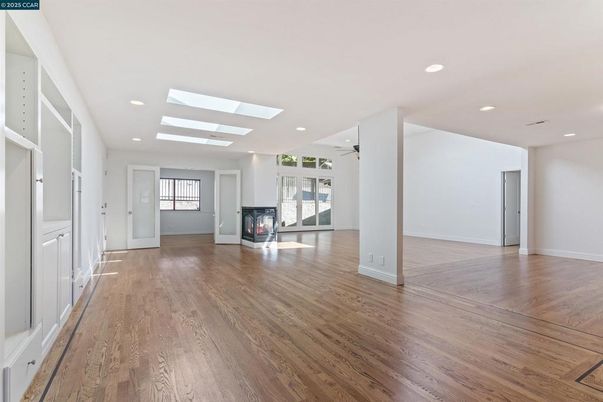 Empty room, Fireplace, Interior, Recessed Lighting, Wood Texture Flooring