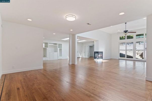 Empty room, Fireplace, Interior, Recessed Lighting, Wood Texture Flooring