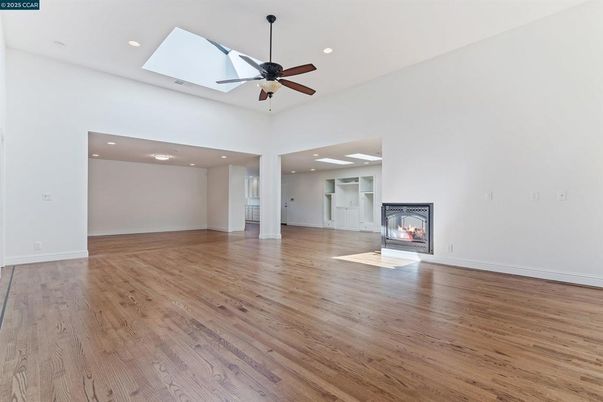 Empty room, Fireplace, Interior, Recessed Lighting, Wood Texture Flooring