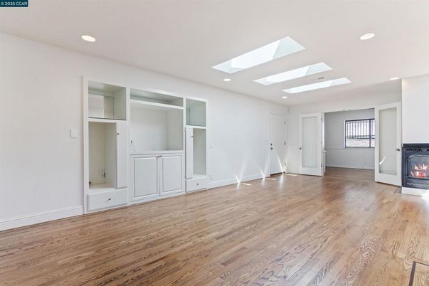 Empty room, Fireplace, Interior, Recessed Lighting, Wood Texture Flooring
