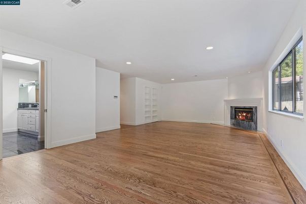 Empty room, Fireplace, Interior, Recessed Lighting, Wood Texture Flooring