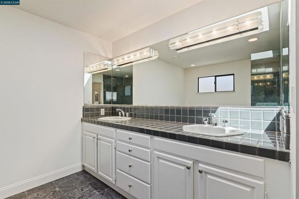 Bathroom, Dual Sink Vanities, Interior, Recessed Lighting, Tile Countertops