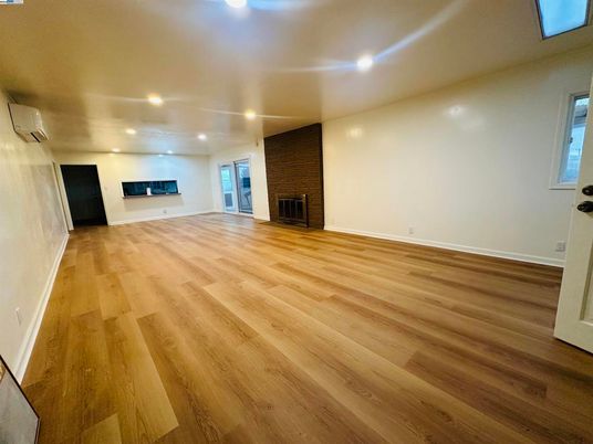 Empty room, Fireplace, Interior, Recessed Lighting, Wood Texture Flooring